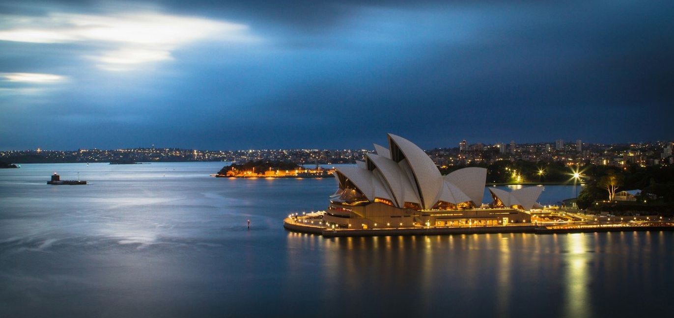 Traveller discovering Australia from a coastal lookout